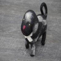 White and Black Felt Dog